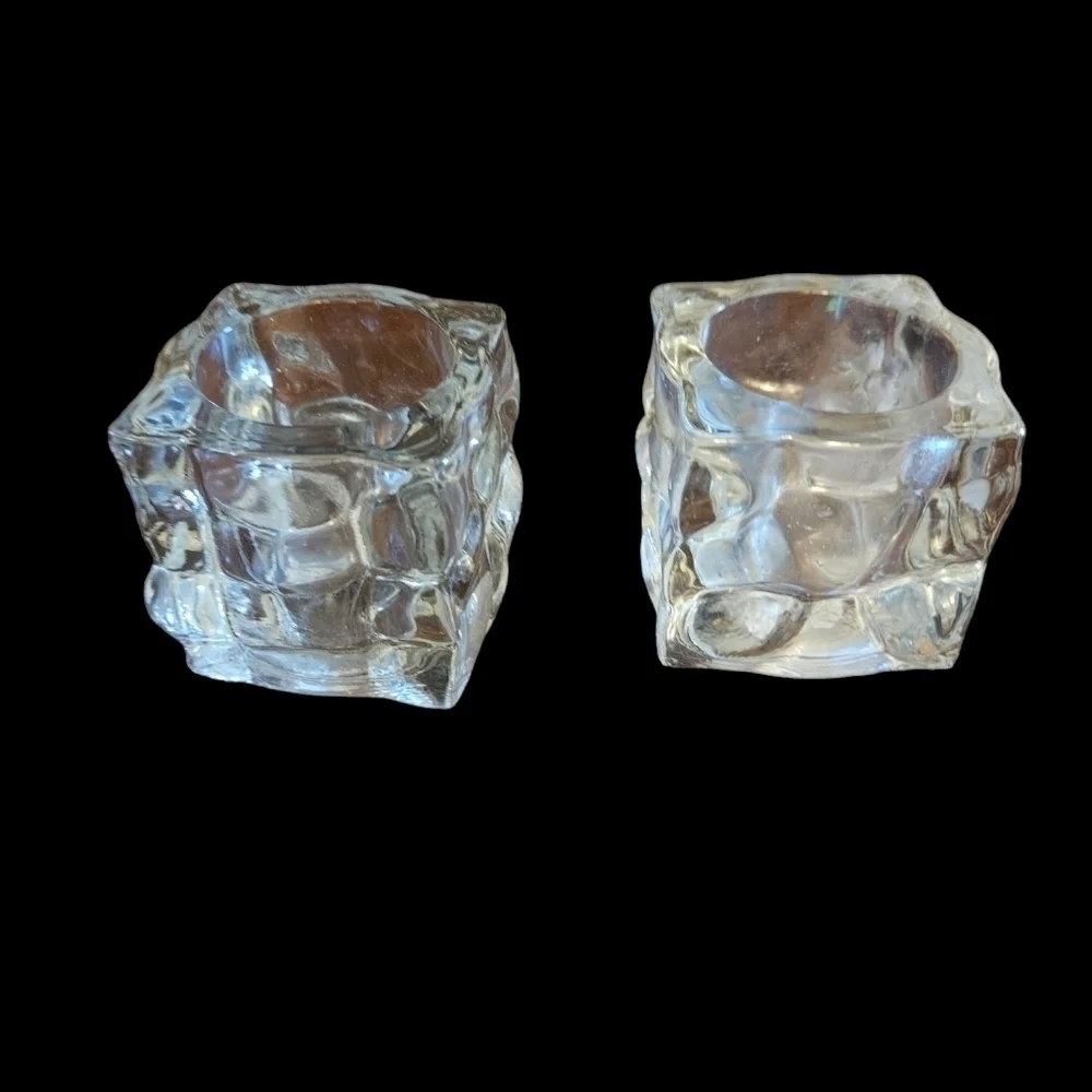 Glass ice cube candle votives.